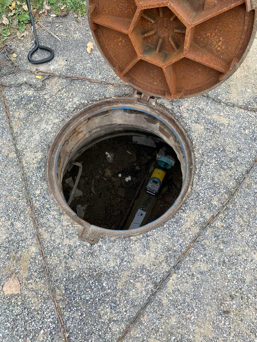 looking inside manhole